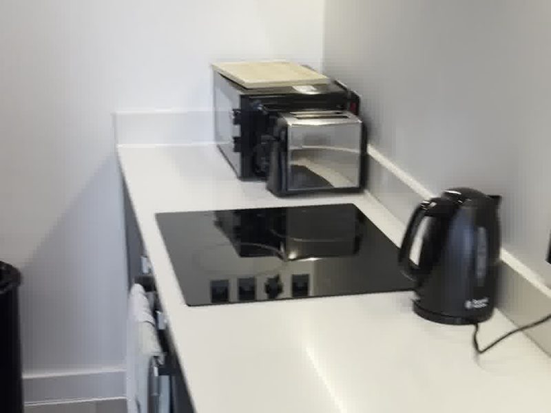 After: short-let changeover kitchen, Manchester